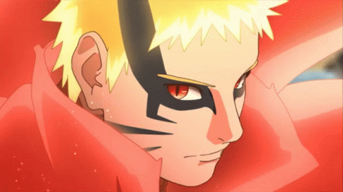 A Close Up Of A Person 'S Face With Red Eyes And Yellow Hair GIF
