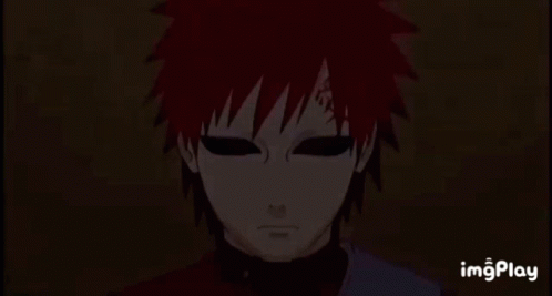 A Close Up Of A Person 'S Face With Red Hair . GIF