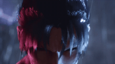 A Close Up Of A Person 'S Face With Red Hair And Blue Hair GIF