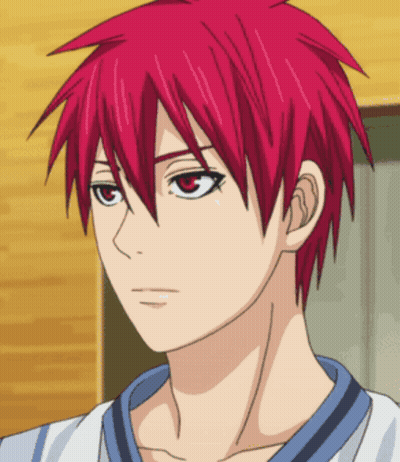 A Close Up Of A Person 'S Face With Red Hair And Red Eyes GIF