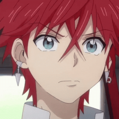 A Close Up Of A Person 'S Face With Red Hair GIF