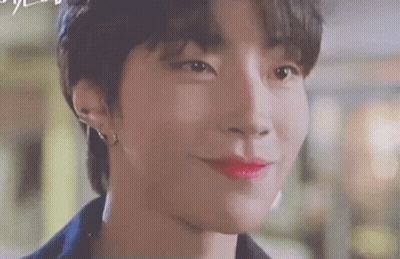 A Close Up Of A Person 'S Face With Red Lipstick On . GIF