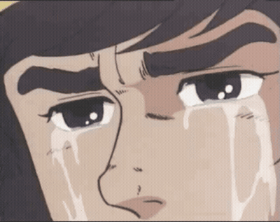 A Close Up Of A Person 'S Face With Tears Coming Out Of It GIF