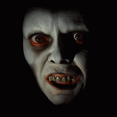 A Close Up Of A Person 'S Face With Teeth GIF