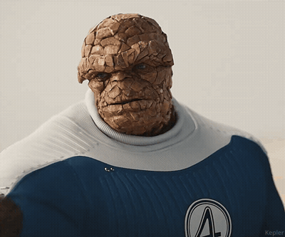 A Close Up Of A Person 'S Face With The Letter A On Their Chest GIF