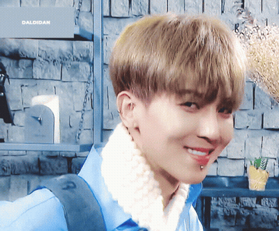 A Close Up Of A Person 'S Face With The Word Daldidan In The Background GIF