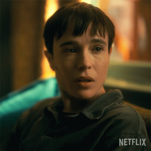A Close Up Of A Person 'S Face With The Word Netflix On The Bottom GIF