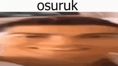 A Close Up Of A Person 'S Face With The Word Osuruk Written On It GIF