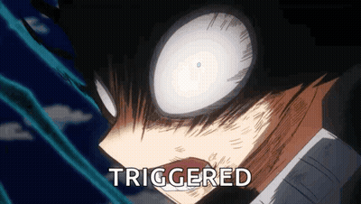 A Close Up Of A Person 'S Face With The Word Triggered On The Bottom Right GIF