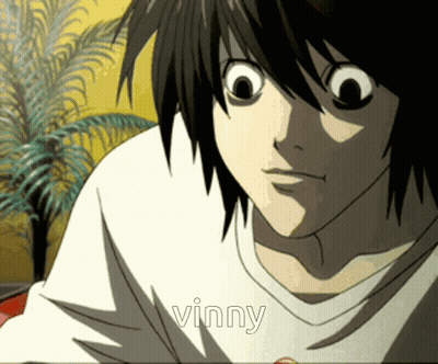 A Close Up Of A Person 'S Face With The Word Vinny On It GIF