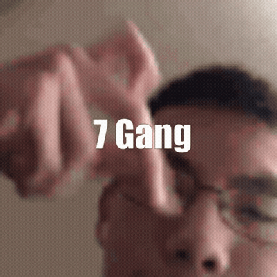 A Close Up Of A Person 'S Face With The Words 7 Gang Written Above It GIF