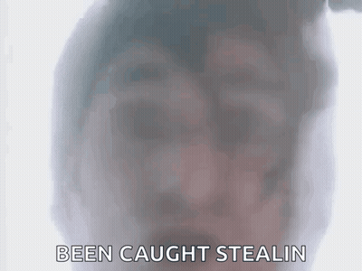 A Close Up Of A Person 'S Face With The Words Been Caught Stealin Written Below It . GIF