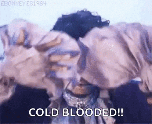 A Close Up Of A Person 'S Face With The Words `` Cold Blooded ! '' GIF