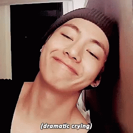 A Close Up Of A Person 'S Face With The Words Dramatic Crying Written On The Bottom GIF