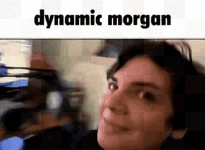 A Close Up Of A Person 'S Face With The Words Dynamic Morgan Written On It . GIF