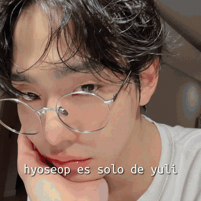 A Close Up Of A Person 'S Face With The Words Hyoseop Es Solo De Yuli Written On The Bottom GIF