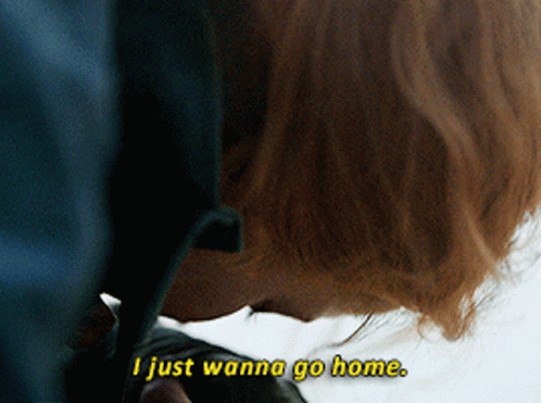 A Close Up Of A Person 'S Face With The Words " I Just Wanna Go Home " Visible GIF