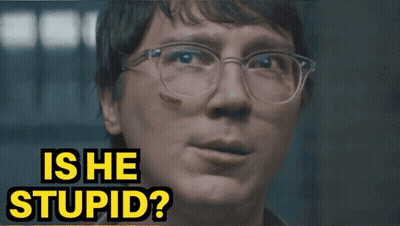 A Close Up Of A Person 'S Face With The Words Is He Stupid Above It GIF