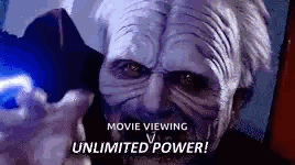 A Close Up Of A Person 'S Face With The Words `` Movie Viewing Unlimited Power '' Written Above It . GIF