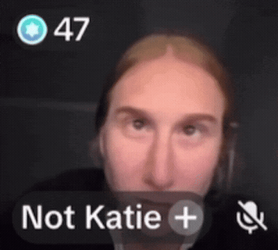 A Close Up Of A Person 'S Face With The Words Not Katie + Visible GIF