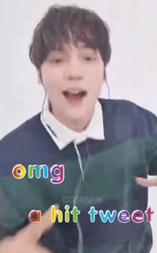 A Close Up Of A Person 'S Face With The Words `` Omg A Hit Tweet '' Written Above It . GIF