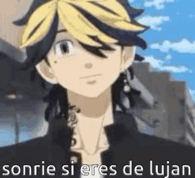 A Close Up Of A Person 'S Face With The Words `` Sonrie Si Eres De Lujan '' . GIF