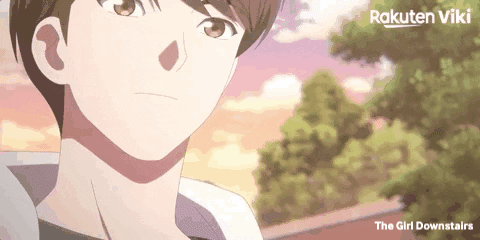 A Close Up Of A Person 'S Face With The Words " The Girl Downstairs " Below It GIF