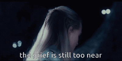 A Close Up Of A Person 'S Face With The Words The Grief Is Still Too Near GIF