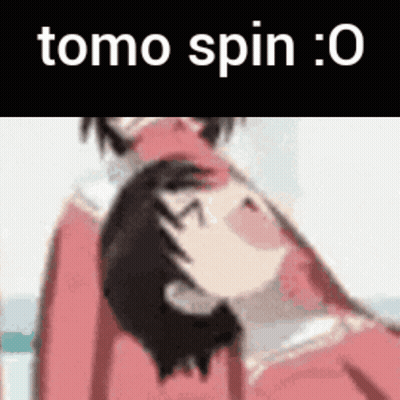 A Close Up Of A Person 'S Face With The Words Tomo Spin : 0 Written On It . GIF