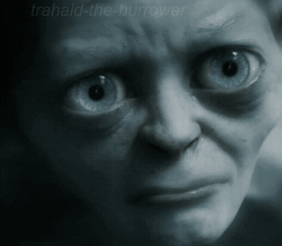 A Close Up Of A Person 'S Face With The Words Trahald-The-Burrower Written On The Bottom GIF
