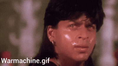 A Close Up Of A Person 'S Face With The Words Warmachine.gif Written Below It GIF