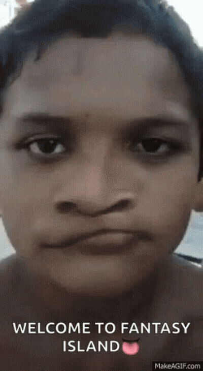 A Close Up Of A Person 'S Face With The Words Welcome To Fantasy Island Written On It GIF