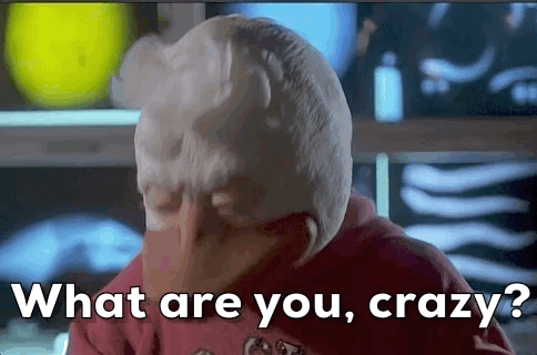 A Close Up Of A Person 'S Face With The Words `` What Are You , Crazy '' Written Above It . GIF