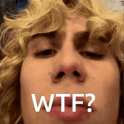 A Close Up Of A Person 'S Face With The Words " Wtf " Written On It GIF