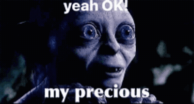 A Close Up Of A Person 'S Face With The Words Yeah Ok My Precious On It GIF