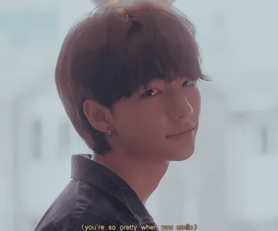 A Close Up Of A Person 'S Face With The Words " You 'Re So Pretty When You Smile " GIF