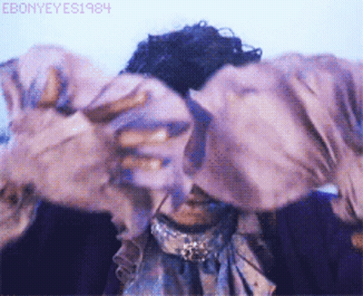A Close Up Of A Person 'S Face With The Year 1984 On The Bottom Left GIF