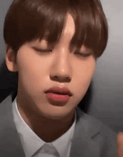 A Close Up Of A Person 'S Face With Their Eyes Closed . GIF