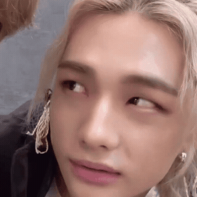 A Close Up Of A Person 'S Face With Their Eyes Closed And Their Mouth Open . GIF