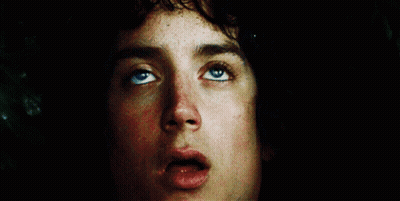 A Close Up Of A Person 'S Face With Their Eyes Looking Up GIF