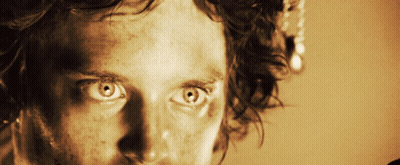 A Close Up Of A Person 'S Face With Their Eyes Looking Up GIF