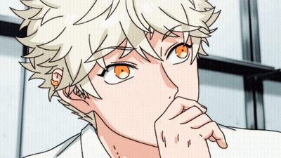 A Close Up Of A Person 'S Face With Their Hand On Their Chin GIF