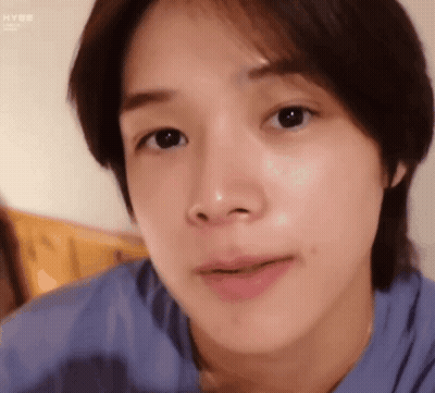 A Close Up Of A Person 'S Face With Their Mouth Open . GIF