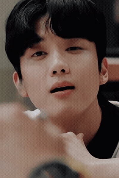 A Close Up Of A Person 'S Face With Their Mouth Open . GIF