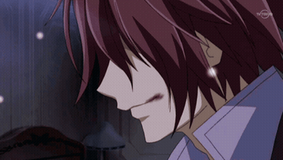 A Close Up Of A Person 'S Face With Tv Tokyo Written On The Bottom GIF