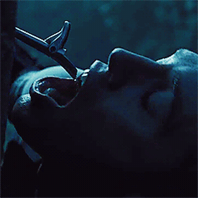 A Close Up Of A Person 'S Face With Water Coming Out Of It GIF