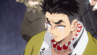 A Close Up Of A Person 'S Face With White Eyes And A Necklace Around Their Neck . GIF