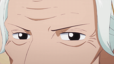 A Close Up Of A Person 'S Face With White Hair And A Black Eye GIF