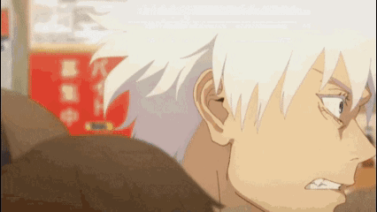 A Close Up Of A Person 'S Face With White Hair And A Serious Look On Their Face . GIF