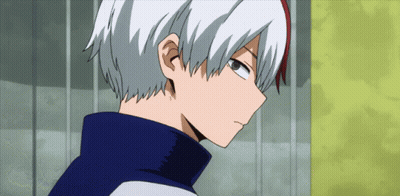 A Close Up Of A Person 'S Face With White Hair And Red Eyes GIF